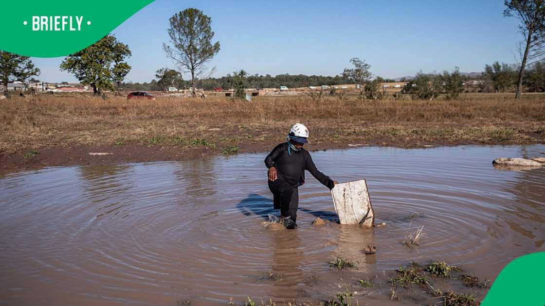 A diver emerges from a body of water in the Eastern Cape where over 80 people died A diver emerges from a body of water in the Eastern Cape where over 80 people died