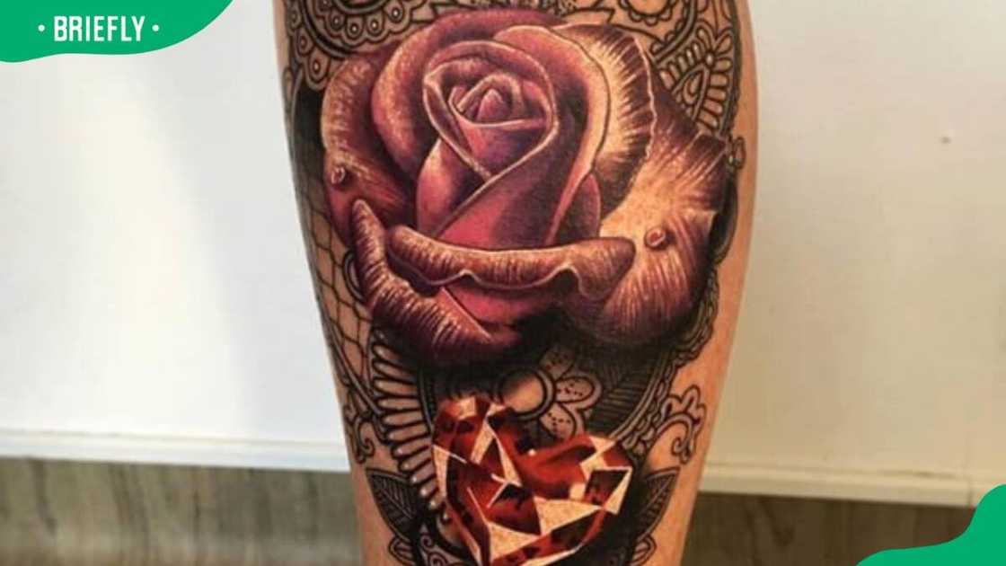 Intricate rose and ruby tattoo Intricate rose and ruby tattoo