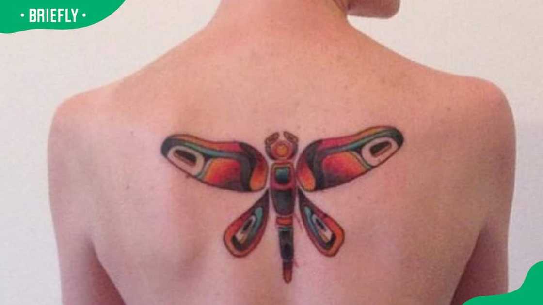 Bright red dragonfly tattoo Bright red dragonfly tattoo